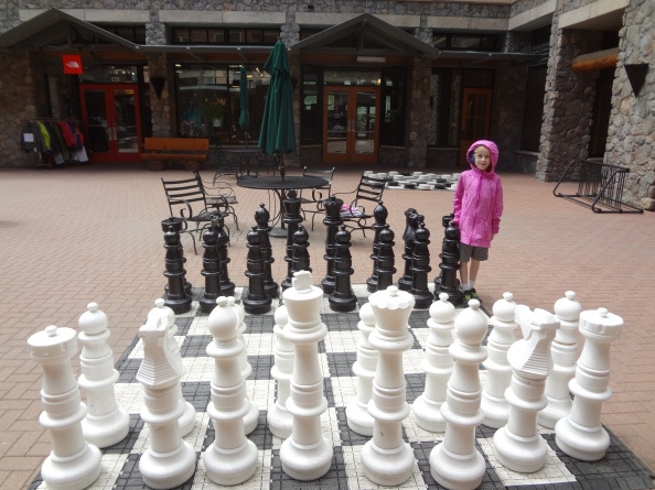 Dante with giant chess pieces.